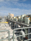 Plow type discharge air cushion belt conveyor