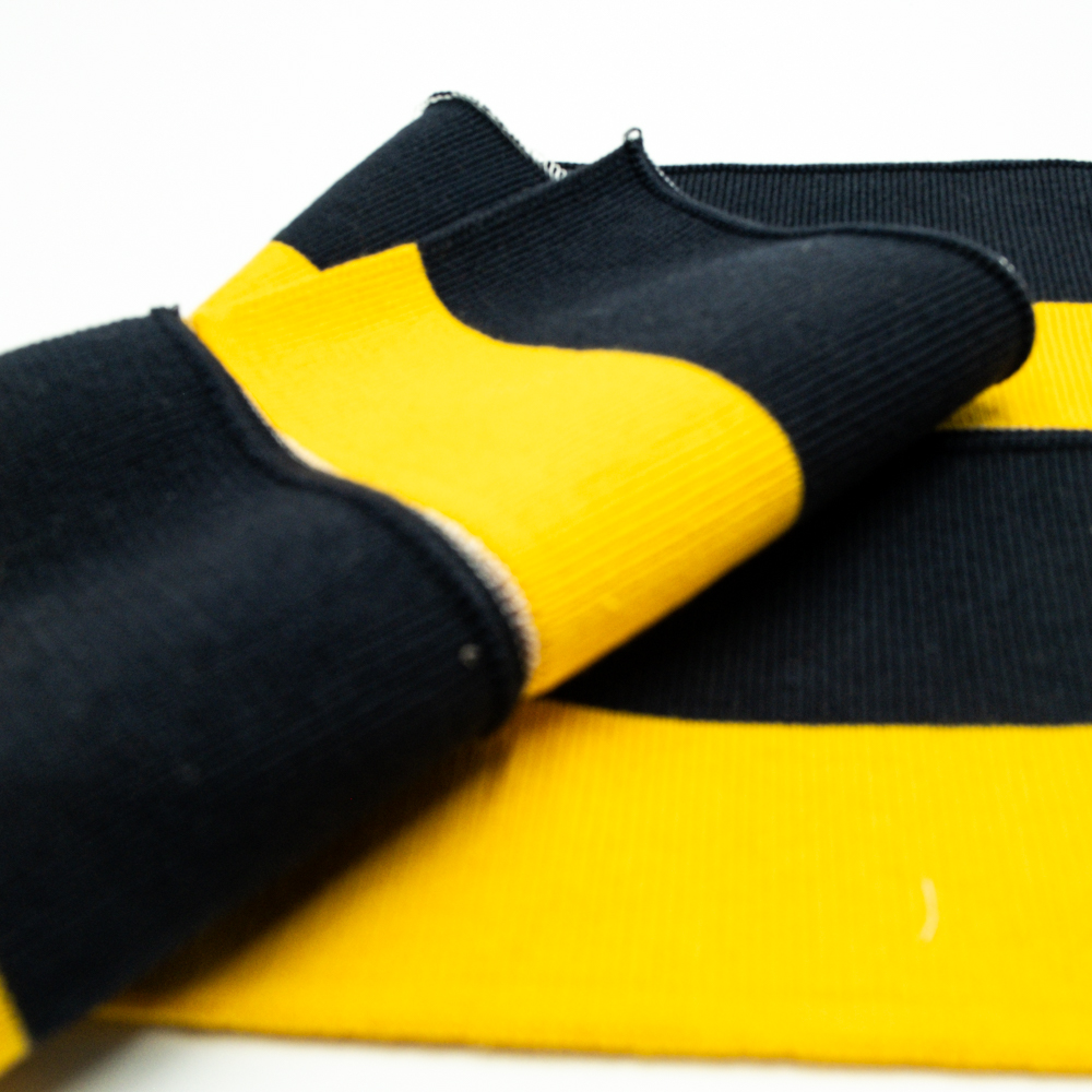 Rib cuffs and hem of coat