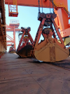 Our company delivered the fourth 70t four-rope and double-Robe clamshell grab to Dandong port