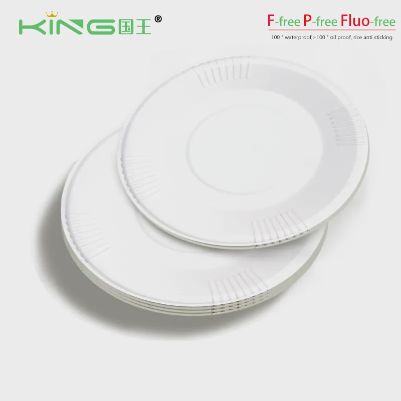 A person in a red shirt working on a machine.