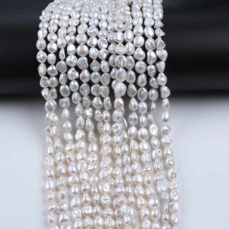 ผู้ผลิตไข่มุกน้ำจืด Zhuji 8-10mm สายไข่มุก Keshi ธรรมชาติ