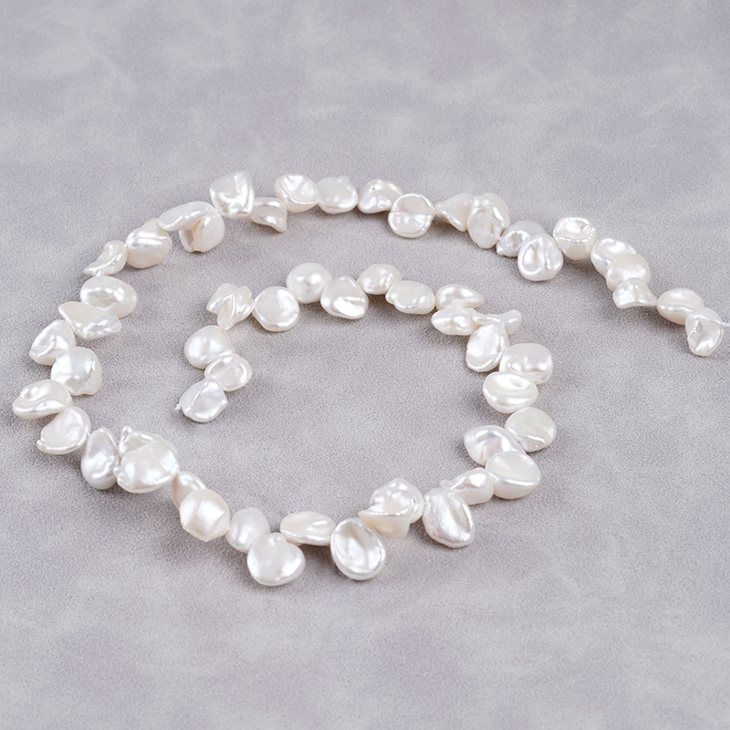 10-11mm ไข่มุกน้ำจืดสีขาวธรรมชาติ ไข่มุกเคชิธรรมชาติ สาย โรงงาน ขายส่ง
