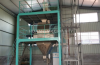 Pre mixed material processing unit