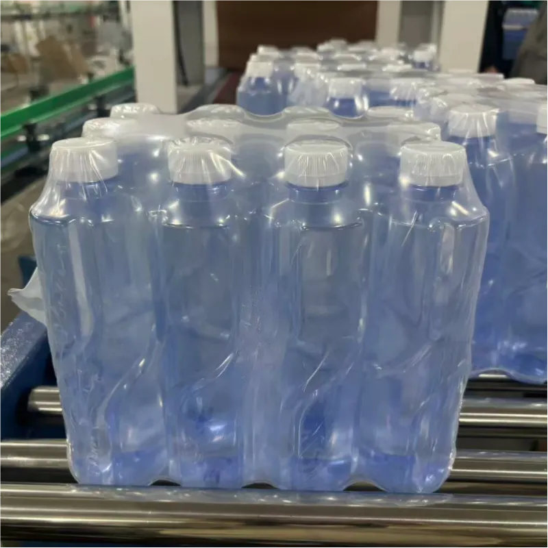 Shrink wrapping machine